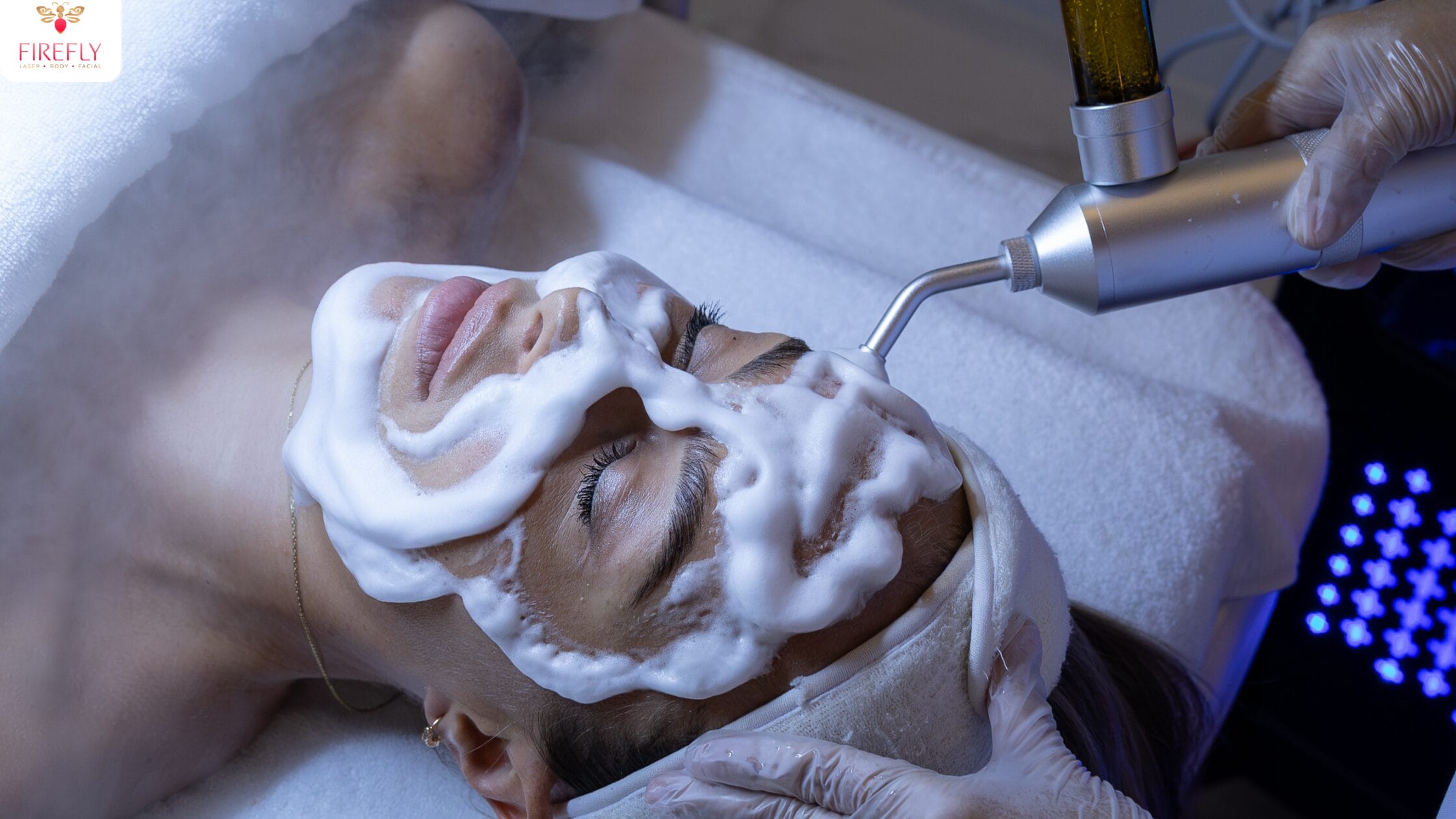 Manual facial extraction performed during Hydrafacial at Firefly.